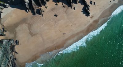 DINGLE 1080 Still 6 Aerial view of a sandy beach—book Dingle Peninsula tour online for stunning coastal scenes.