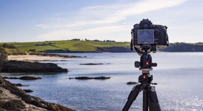 A camera on a tripod captures the calm coast along the Wild Atlantic Way private tour Dingle.
