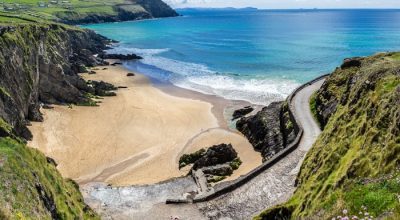 Pathway curving down to a sandy beach—perfect for your Dingle Peninsula private day tour.