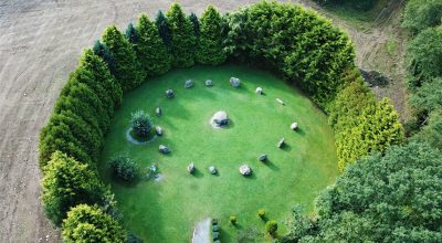 Aerial view of a stone circle on grass, perfect for your Dingle Peninsula private day tour.